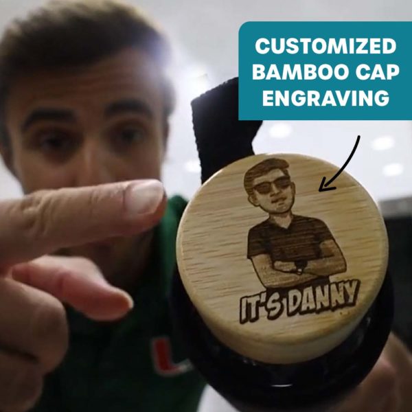 Man showcasing custom engraved bamboo cap